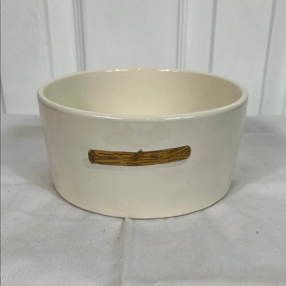 NWOT Rae Dunn white dog bowl 6”wide, 3”tall. Stick on front, WOOF inside bottom